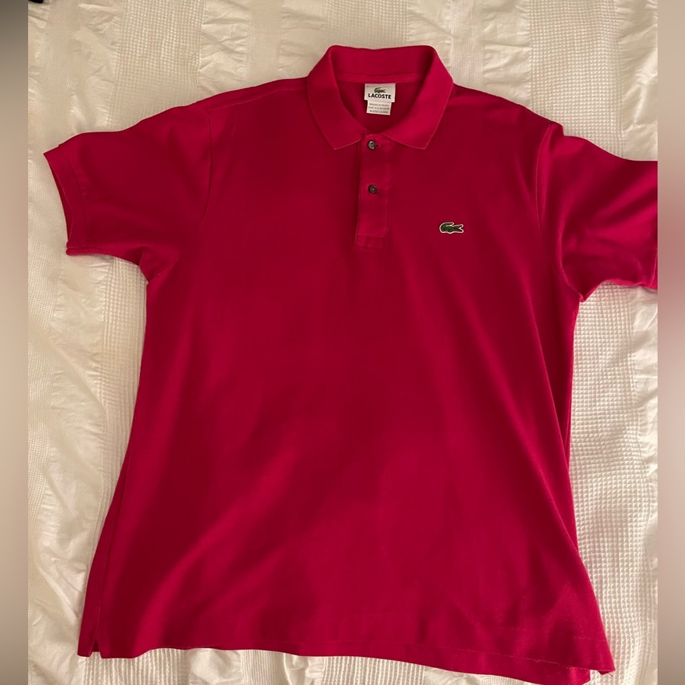 Lacoste polo in pink.